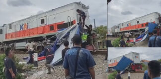 sebuah tenda PKL tersangkut di hulu Kereta Api dikawasan Cimencrang Bandung